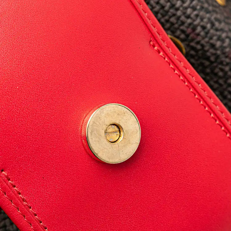 Yves Saint Laurent Coated Canvas Bucket Bag