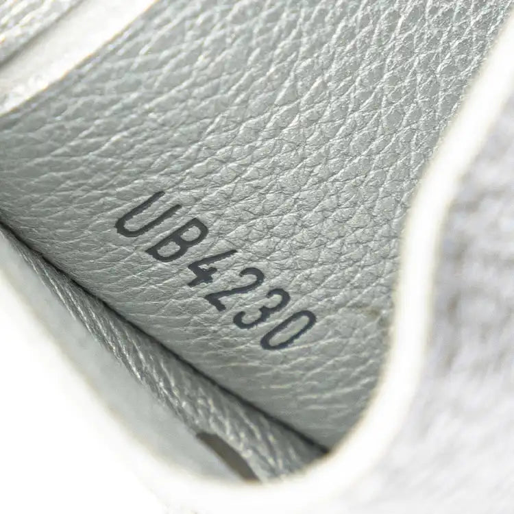 Louis Vuitton Leather Lockmini Wallet