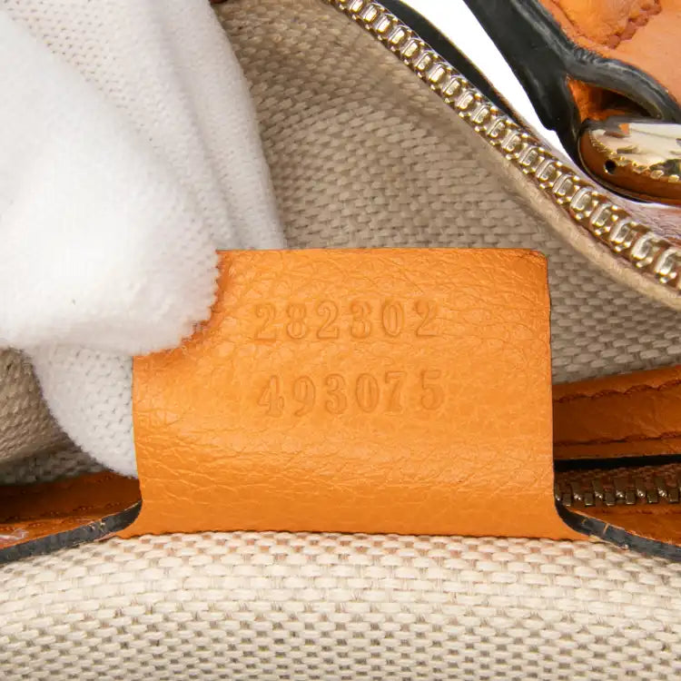 Gucci Medium Pebbled Calfskin Soho Boston Bag