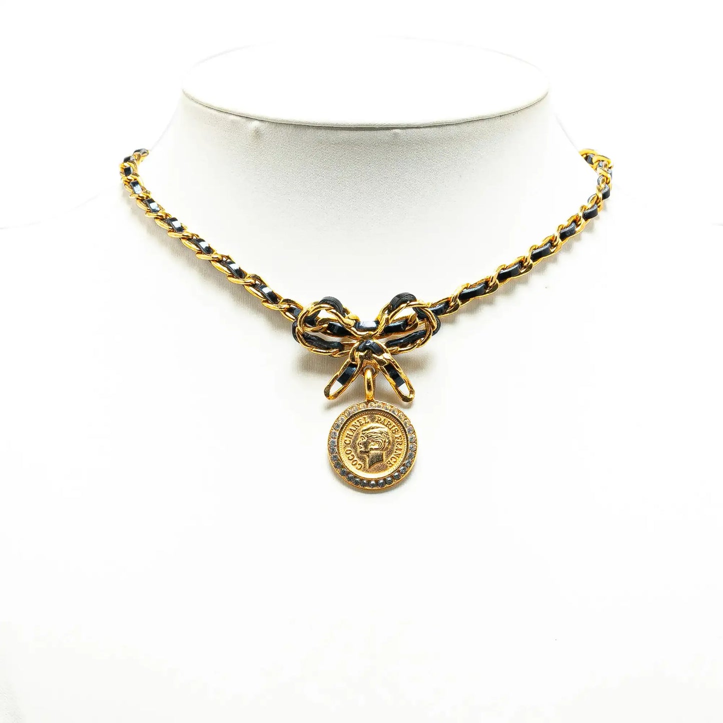 Chanel Leather and Gold Plated Medallion Bow Pendant Necklace