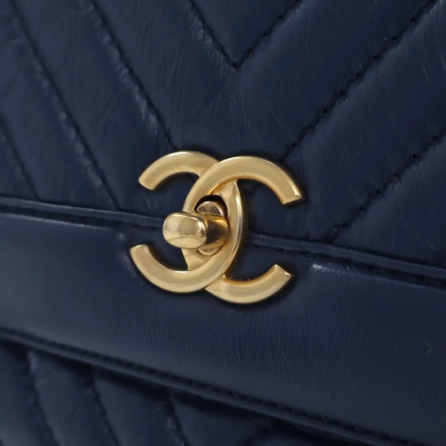 Chanel CC Chevron Aged Calfskin Top Handle Flap