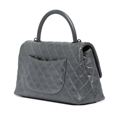 Chanel Small Quilted Aged Calfskin Coco Top Handle Bag