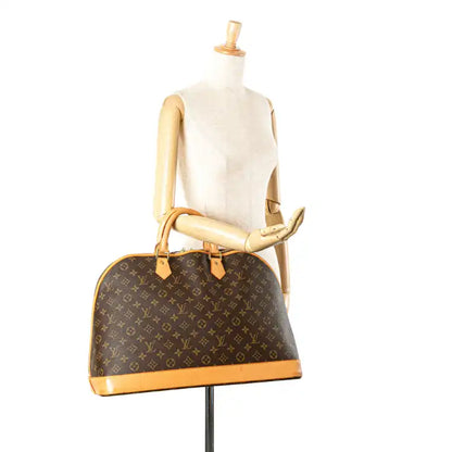 Louis Vuitton Monogram Alma Voyage MM