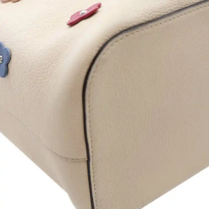 Louis Vuitton Flower Embellished Lockme Bucket Bag