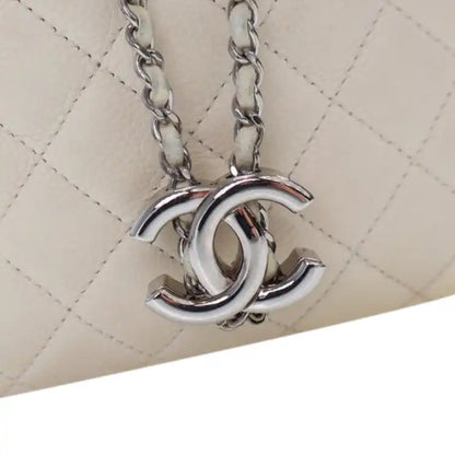 Chanel Small Quilted Caviar Flat Drawstring Chain Bucket Bag