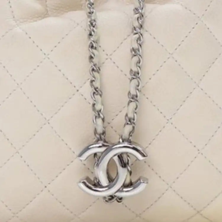 Chanel Small Quilted Caviar Flat Drawstring Chain Bucket Bag
