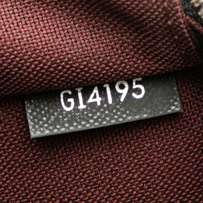 Louis Vuitton Monogram Macassar Porte Documents Voyage