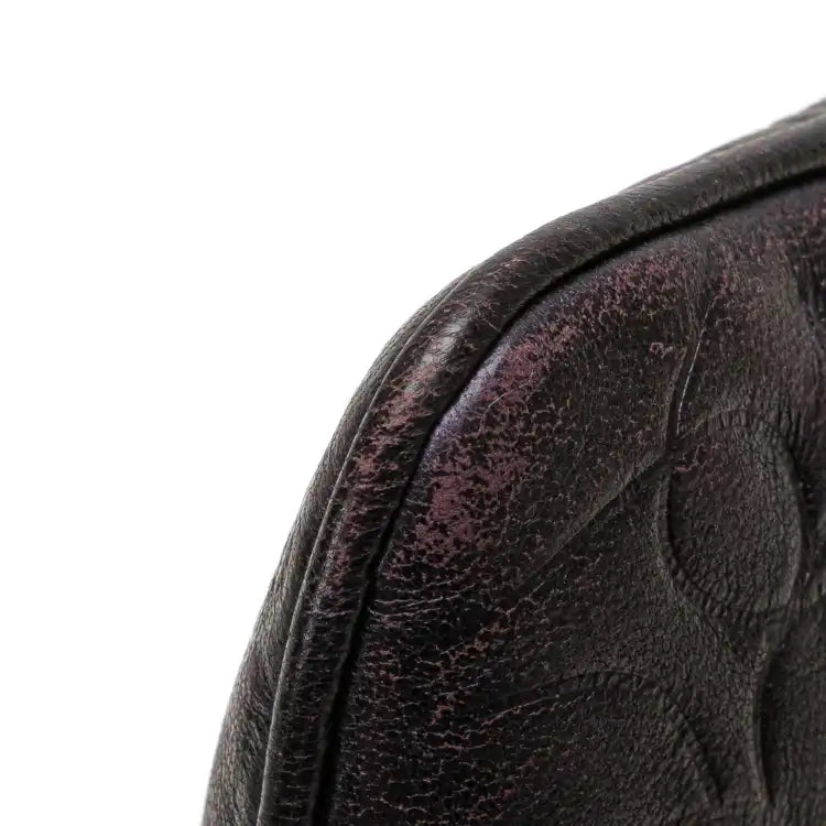 Chanel Embossed Lambskin Camellia Chain Pochette