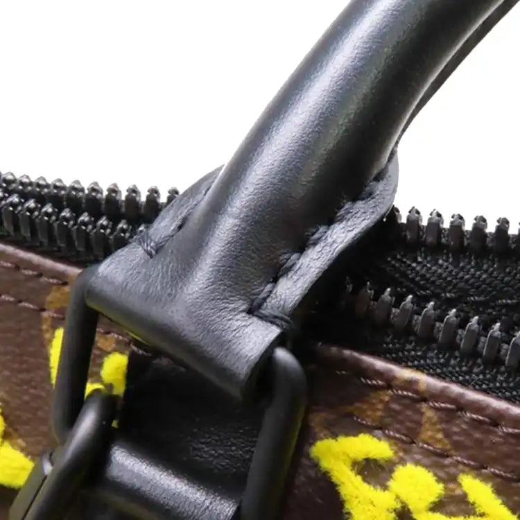 Louis Vuitton Monogram Tuffetage Triangle Keepall Bandouliere 50