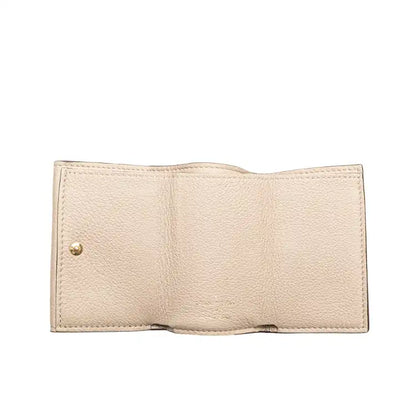 Louis Vuitton Leather Lockmini Compact Wallet
