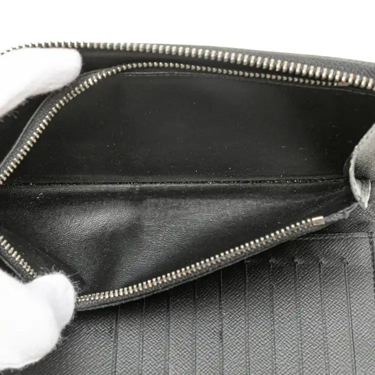 Louis Vuitton Monogram Eclipse Vertical Zippy Wallet