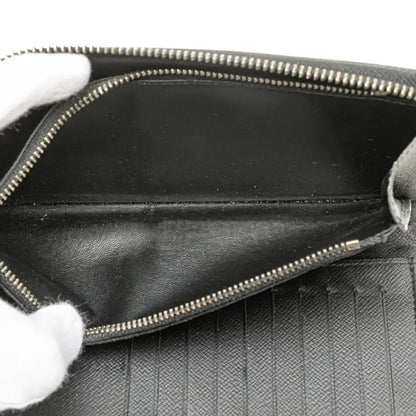 Louis Vuitton Monogram Eclipse Vertical Zippy Wallet