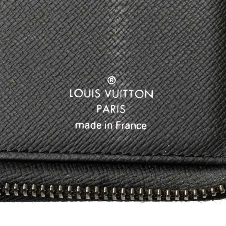 Louis Vuitton Monogram Eclipse Vertical Zippy Wallet