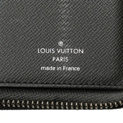 Louis Vuitton Monogram Eclipse Vertical Zippy Wallet