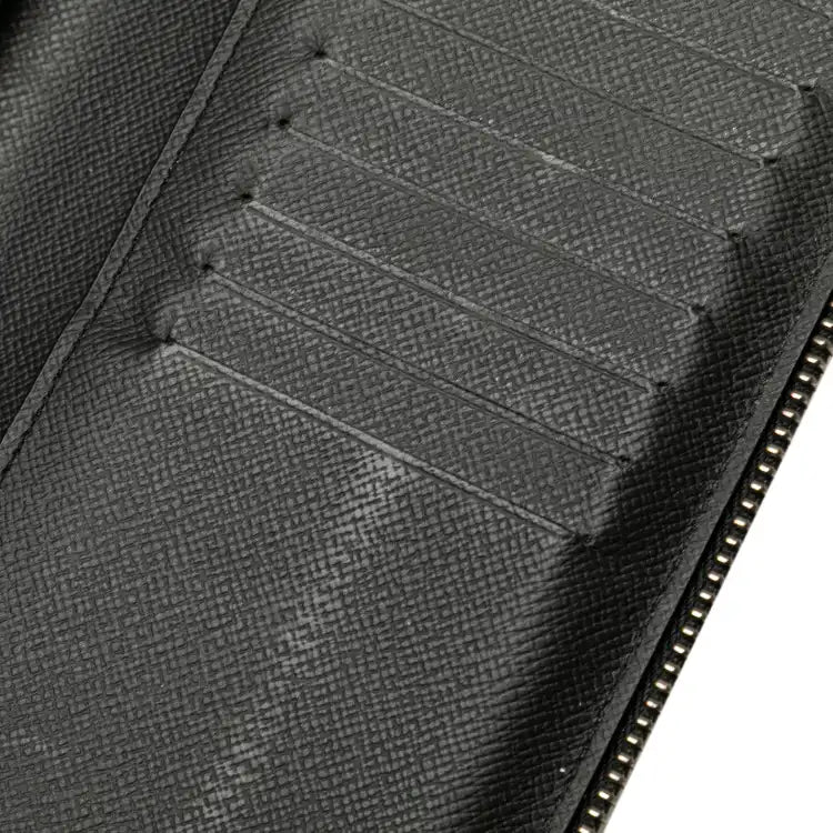 Louis Vuitton Monogram Eclipse Vertical Zippy Wallet