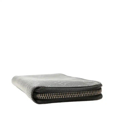 Louis Vuitton Monogram Eclipse Vertical Zippy Wallet