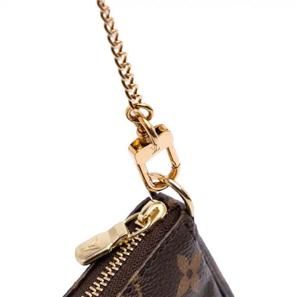 Louis Vuitton Monogram Transatlantic Mini Pochette Accessoires