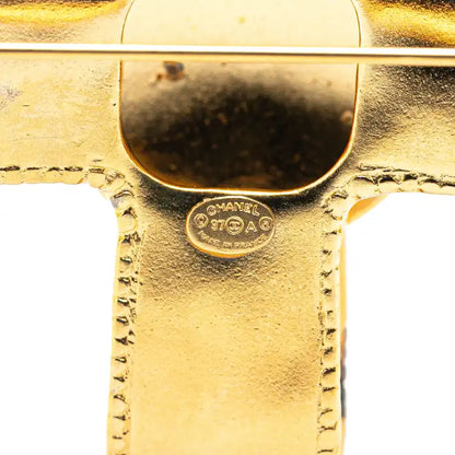 Chanel Gold Plated CC Ribbon Cross Brooch