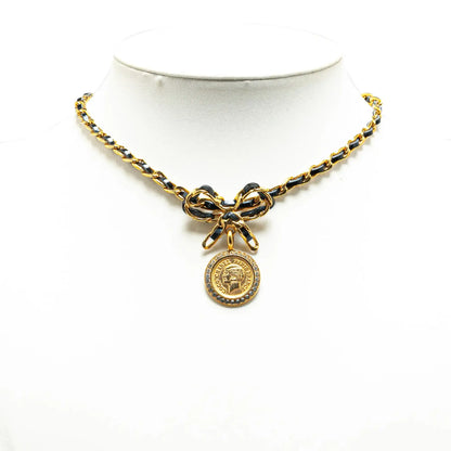 Chanel Leather and Gold Plated Medallion Bow Pendant Necklace