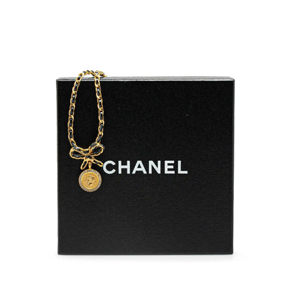 Chanel Leather and Gold Plated Medallion Bow Pendant Necklace