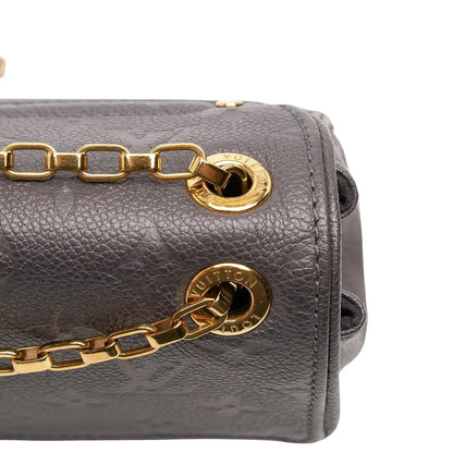 Louis Vuitton Monogram Empreinte Studded Saint Germain PM