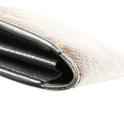 Louis Vuitton Monogram Macassar Zippy Dragonne Wallet
